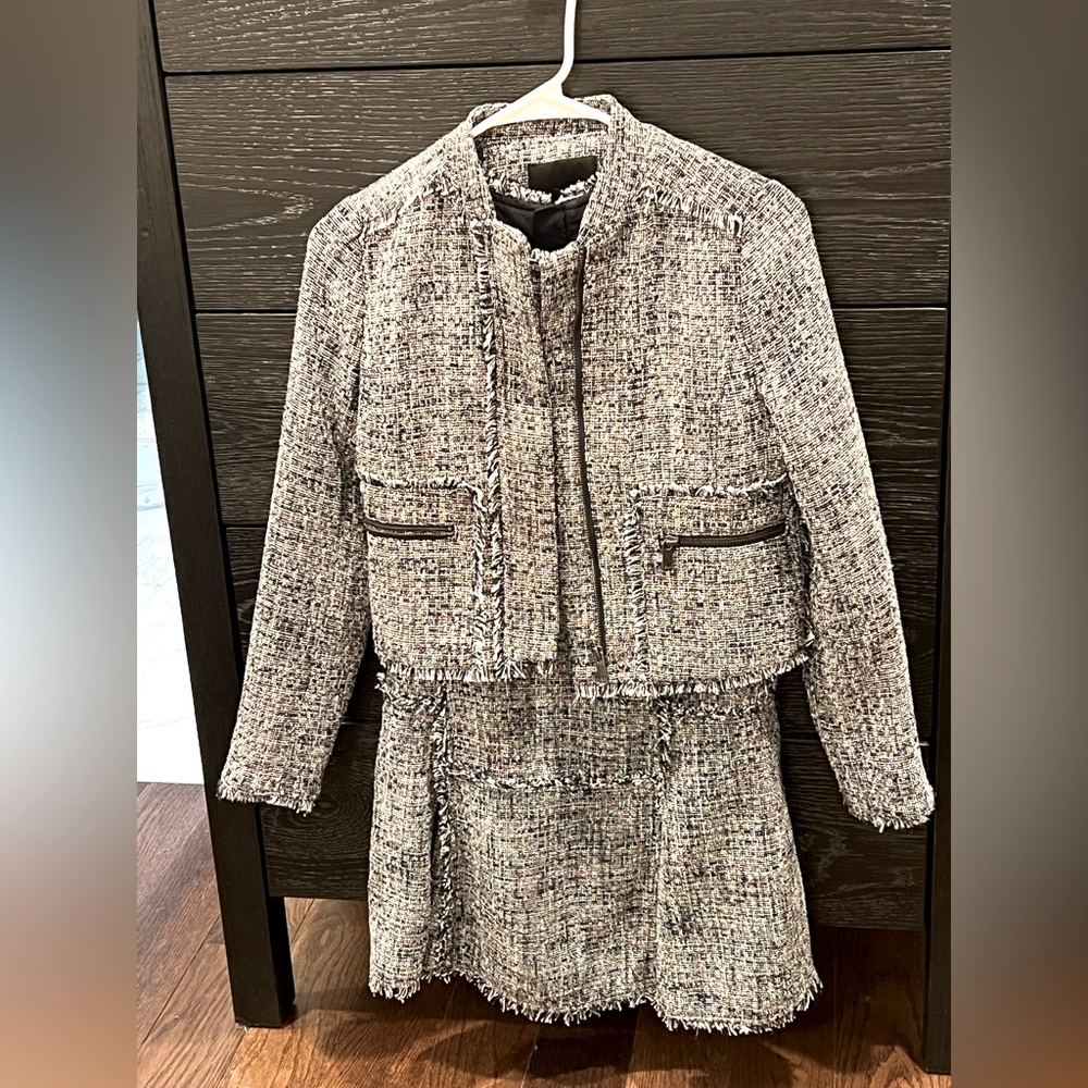 Navy tweed sleeveless mini dress /cropped blazer. Everyone thinks it’s Chanel!